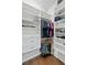 Custom walk-in closet with ample storage, shelving, and hanging space at 4216 Tattnall Run, Acworth, GA 30101