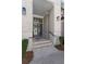 Close-up view of the front entrance, featuring a brick walkway and a grey front door at 4216 Tattnall Run, Acworth, GA 30101