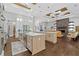 Spacious kitchen features double islands, modern appliances, and hardwood flooring at 4216 Tattnall Run, Acworth, GA 30101