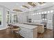 Gourmet kitchen with marble countertops, stainless appliances, and an open layout at 4216 Tattnall Run, Acworth, GA 30101