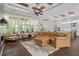 Expansive living room with coffered ceiling, large windows, and seamless flow to the kitchen at 4216 Tattnall Run, Acworth, GA 30101