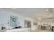 Bright lobby with chandelier, seating, and front desk featuring elegant design elements and a clock at 4216 Tattnall Run, Acworth, GA 30101