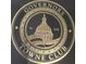 Close-up of the Governors Towne Club logo featuring a gold emblem with a building and the year 2002 at 4216 Tattnall Run, Acworth, GA 30101