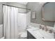Clean bathroom featuring a shower-tub combination, single vanity, and marble countertop at 5015 Preservation Pointe Nw, Kennesaw, GA 30152
