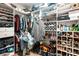 Spacious walk-in closet featuring custom shelving, ample hanging space, and organized storage solutions at 5015 Preservation Pointe Nw, Kennesaw, GA 30152