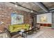 Modern lobby space with exposed brick, contemporary furnishings, and artistic decor at 3180 Mathieson Ne Dr # 1001, Atlanta, GA 30305