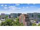Expansive city view with high rise apartments and neighborhood trees during daytime blue sky at 3180 Mathieson Ne Dr # 1001, Atlanta, GA 30305