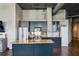 Modern kitchen with stainless steel appliances, granite countertops, and breakfast bar at 3180 Mathieson Ne Dr # 1001, Atlanta, GA 30305