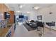 Modern condo living area with a stainless steel kitchen, an open floor plan, and city views at 3180 Mathieson Ne Dr # 1001, Atlanta, GA 30305