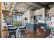 Open concept living space with kitchen, dining, and living room and exposed ductwork at 3180 Mathieson Ne Dr # 1001, Atlanta, GA 30305
