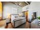 Comfortable and inviting main bedroom with neutral tones and a barn door leading to the closet at 3180 Mathieson Ne Dr # 1001, Atlanta, GA 30305