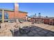 Enjoy city views from this rooftop terrace, complete with fire pit and lounge seating at 3180 Mathieson Ne Dr # 1001, Atlanta, GA 30305
