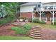 Cozy backyard patio featuring comfortable seating and fire pit at 4140 Summit Dr, Marietta, GA 30068