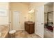 Beautiful bathroom showcasing a marble countertop vanity, soaking tub and glass enclosed shower, next to the primary bedroom at 5888 Cobblestone Creek Cir, Mableton, GA 30126