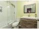 Updated bathroom with a glass-enclosed shower, modern vanity, and stylish mirror at 5888 Cobblestone Creek Cir, Mableton, GA 30126
