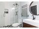 Modern bathroom with glass shower, sleek fixtures, and unique tile work at 5888 Cobblestone Creek Cir, Mableton, GA 30126
