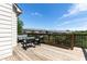 Spacious deck with outdoor seating and wood railings offering neighborhood views at 5888 Cobblestone Creek Cir, Mableton, GA 30126