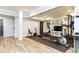 Home gym area featuring exercise equipment, storage, and access to other areas at 5888 Cobblestone Creek Cir, Mableton, GA 30126
