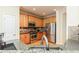 Well-equipped kitchen featuring stainless steel appliances, wood cabinets, and granite countertops at 5888 Cobblestone Creek Cir, Mableton, GA 30126