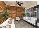 Covered patio with comfortable seating, outdoor decor, and inviting ambiance at 5888 Cobblestone Creek Cir, Mableton, GA 30126