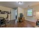 This bedroom offers a wood floor, light colored walls, and a window with white wooden shutters at 2497 Edwards Nw Dr, Atlanta, GA 30318