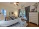 This bedroom features hardwood floors, light colored walls, and doors leading to the deck at 2497 Edwards Nw Dr, Atlanta, GA 30318