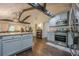 Open-concept kitchen flows into the living area, featuring stainless steel appliances, and lots of natural light at 2497 Edwards Nw Dr, Atlanta, GA 30318