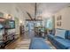 Open-concept living room flows into kitchen and dining area, creating a bright and airy space at 2497 Edwards Nw Dr, Atlanta, GA 30318