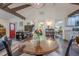 Bright open-concept living space with a dining area and a glimpse of a vibrant red front door at 2497 Edwards Nw Dr, Atlanta, GA 30318
