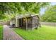 A screened in porch and walkway to a paved patio at 2497 Edwards Nw Dr, Atlanta, GA 30318