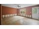 This is a living room in need of remodeling, including floor and baseboards at 4896 Muirwood Dr, Powder Springs, GA 30127
