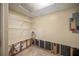 Unfinished utility room with shelving, damaged drywall, and plumbing at 4896 Muirwood Dr, Powder Springs, GA 30127