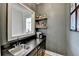 The bar area has a sink, shelves for storage, and a large mirror at 93 Ridgetree Ln, Marietta, GA 30068