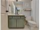 A clean bathroom featuring modern fixtures, white tile floors, and stylish decor at 93 Ridgetree Ln, Marietta, GA 30068