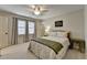 A well lit bedroom with carpet, a queen sized bed, and modern decor at 93 Ridgetree Ln, Marietta, GA 30068