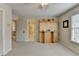 Neutral bedroom featuring a wooden Murphy bed and natural light at 93 Ridgetree Ln, Marietta, GA 30068