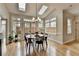 The bright breakfast nook is surrounded by windows and has outdoor access to the patio at 93 Ridgetree Ln, Marietta, GA 30068