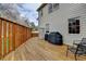 A spacious wooden deck featuring outdoor seating and grill at 93 Ridgetree Ln, Marietta, GA 30068