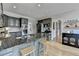 The kitchen has an island with bar stool seating, stainless steel appliances, and hardwood flooring at 93 Ridgetree Ln, Marietta, GA 30068
