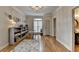 Bright office with a craft table, charming decor, hardwood floors and an ensuite powder room at 93 Ridgetree Ln, Marietta, GA 30068