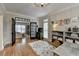 Spacious office boasting built-in shelves, French doors, and bright natural light at 93 Ridgetree Ln, Marietta, GA 30068