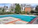 Community pool with play area is covered for off-season use, providing a safe environment for neighborhood residents at 93 Ridgetree Ln, Marietta, GA 30068