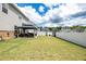 Spacious backyard with a gazebo and white fencing, providing ample space for outdoor activities at 13568 Scenic Pkwy, Covington, GA 30014
