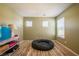 Bright bedroom featuring a comfortable dog bed and a nice area rug at 13568 Scenic Pkwy, Covington, GA 30014
