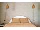 Bedroom featuring neutral walls, boho light fixtures, and a bed at 13568 Scenic Pkwy, Covington, GA 30014