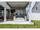 Inviting covered outdoor hot tub featuring convenient access steps for ultimate relaxation at 13568 Scenic Pkwy, Covington, GA 30014