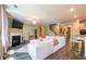 Spacious living room featuring a fireplace, comfortable seating, and stylish decor elements at 13568 Scenic Pkwy, Covington, GA 30014