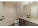 Standard bathroom featuring a shower/tub combo, vanity, and neutral wall paint at 257 Pinewood Dr, Covington, GA 30014