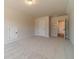 Neutral bedroom features soft carpet, and doors to other rooms of the house at 257 Pinewood Dr, Covington, GA 30014