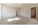 Bedroom featuring neutral carpet and classic white doors with black hardware throughout at 257 Pinewood Dr, Covington, GA 30014